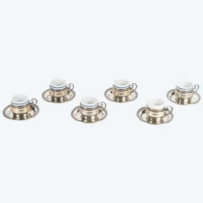 Une Série de Tasses en porcelaine et Argent Massif