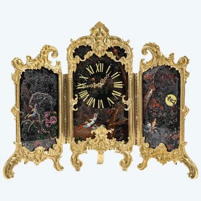 Une pendule Paravent en bronze doré et verre Peint, art nouveau
