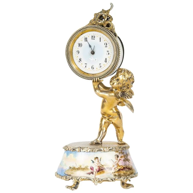 Une belle miniature une pendulette en argent massif